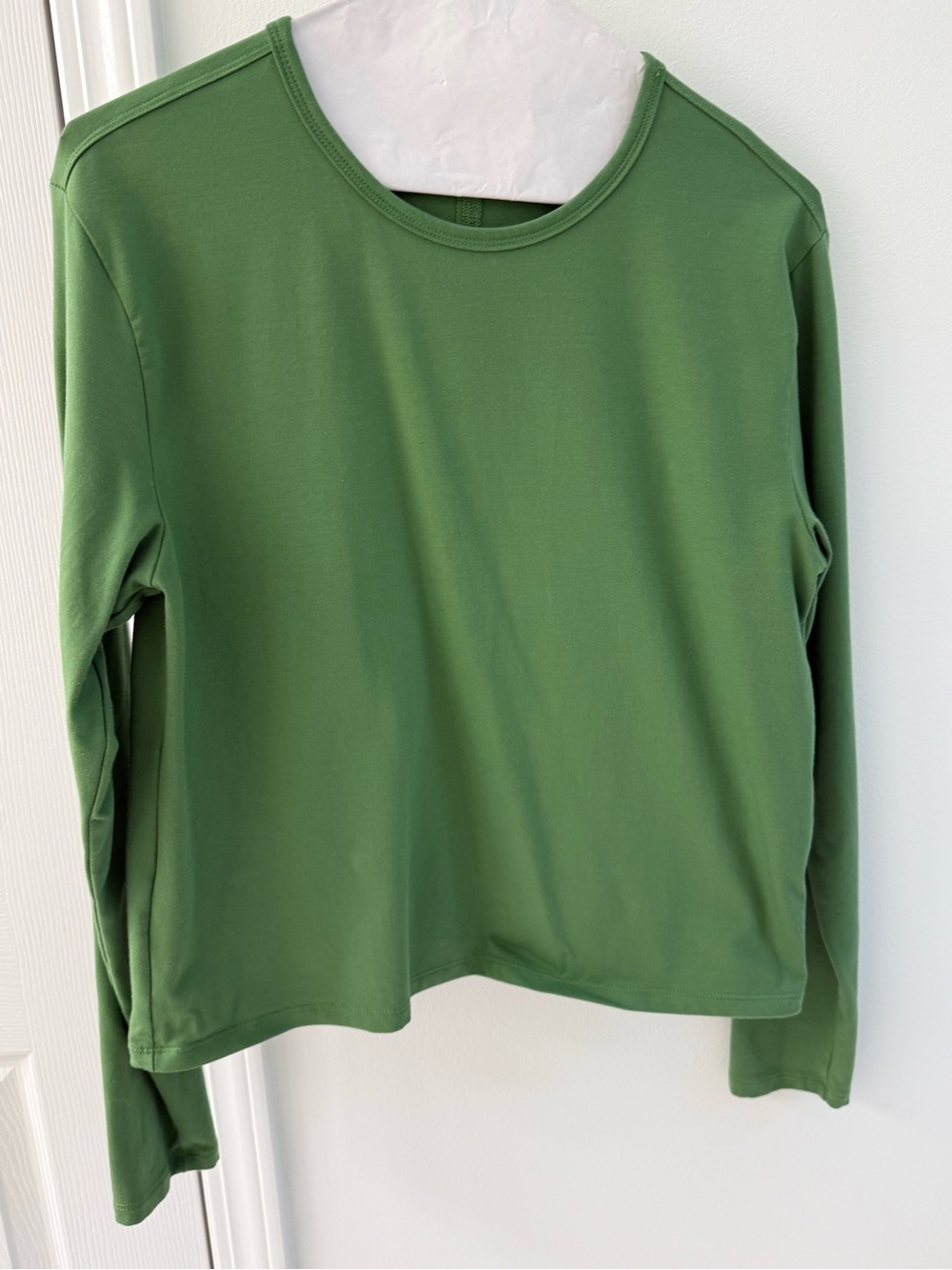 Athleta Essential Top. Green Long Sleeve. Hits at waist